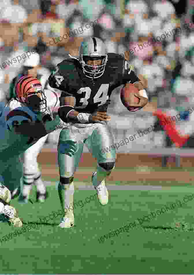A Dynamic Photograph Capturing The Legendary Running Back Bo Jackson Breaking Through The Defense With Incredible Speed And Power During A Raiders Game. Tales From The Oakland Raiders Sideline: A Collection Of The Greatest Raiders Stories Ever Told