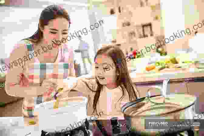 A Mother And Daughter Cooking Together In The Kitchen The Family Dinner: Great Ways To Connect With Your Kids One Meal At A Time