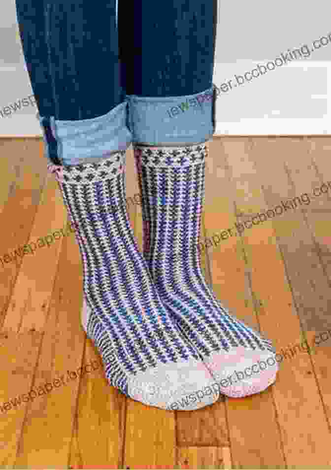 A Pair Of Two Tone Socks Knit In A Plain Stitch. Adult Two Tone Sock Knitting Pattern: Intermediate Skill Level
