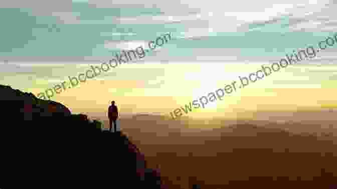 A Traveler Standing On A Hilltop Watching A Sunset Travel Mania: Stories Of Wanderlust