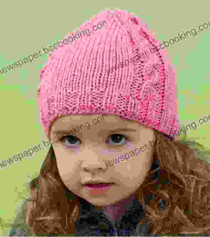 Adorable Child Wearing A Cable Knit Beanie With Playful Tassels. Copious Cables Beanie Knitting Pattern All Sizes Newborn Through Adult Man Included