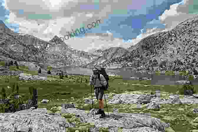 Hikers Traverse A Section Of The Iconic John Muir Trail, Passing By Granite Cliffs And Towering Waterfalls In Yosemite National Park. The Great Outdoors: The Wilderness Of California: My First Summer In The Sierra Picturesque California The Mountains Of California The Yosemite Our National Parks
