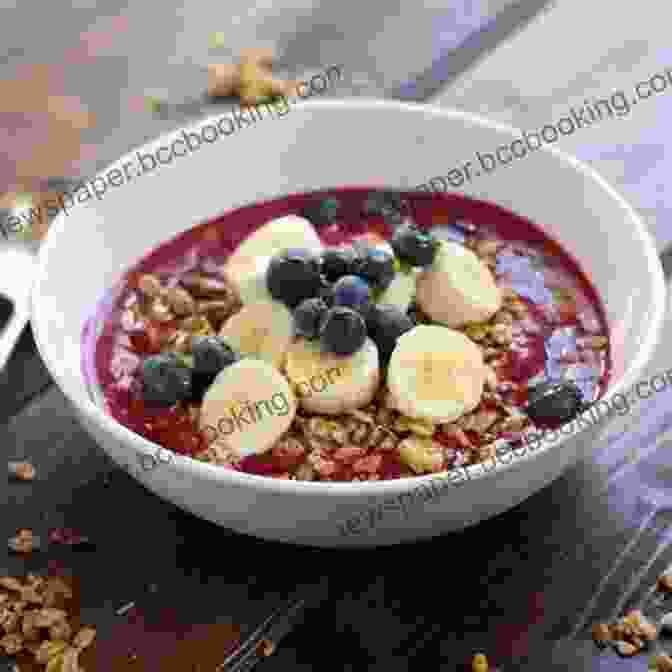 Smooth And Creamy Banana Smoothie Topped With Granola, Berries, And A Drizzle Of Honey The Healthy Teen Cookbook: Around The World In 80 Fantastic Recipes (Teen Girl Gift)